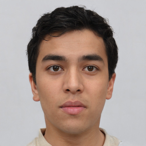 Neutral white young-adult male with short  black hair and brown eyes