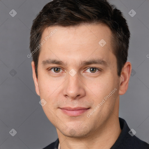 Joyful white young-adult male with short  brown hair and brown eyes