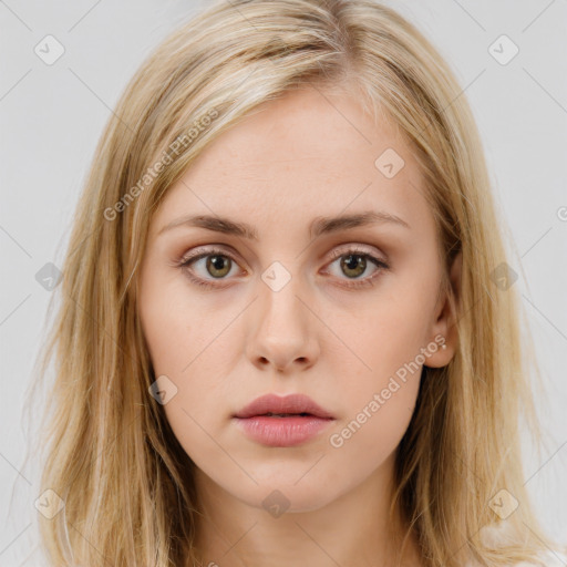 Neutral white young-adult female with long  brown hair and brown eyes