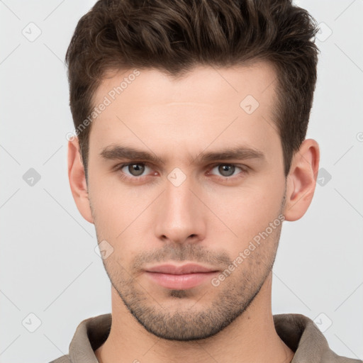 Neutral white young-adult male with short  brown hair and brown eyes