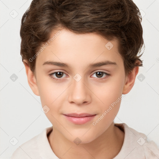 Joyful white child male with short  brown hair and brown eyes