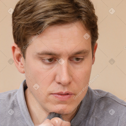 Neutral white adult male with short  brown hair and grey eyes