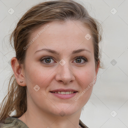 Joyful white young-adult female with medium  brown hair and blue eyes