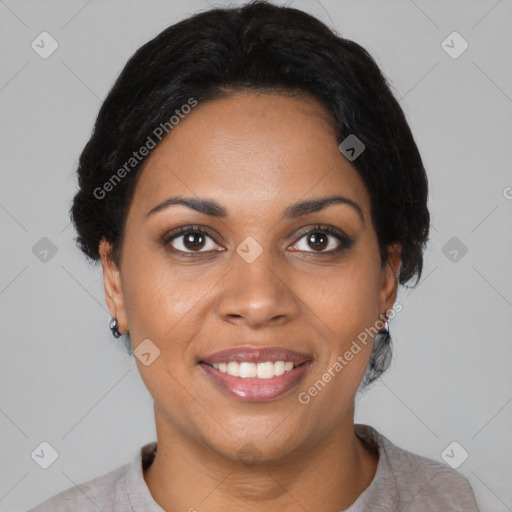 Joyful black young-adult female with medium  black hair and brown eyes