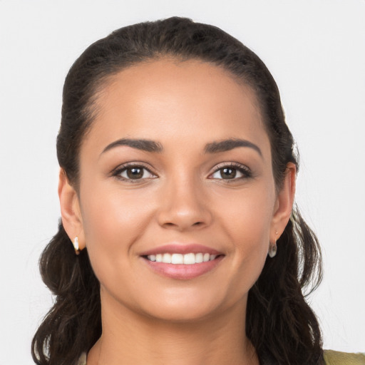 Joyful white young-adult female with long  brown hair and brown eyes