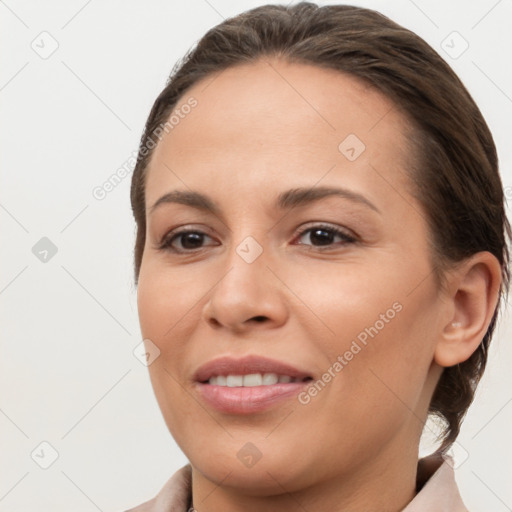 Joyful white young-adult female with medium  brown hair and brown eyes