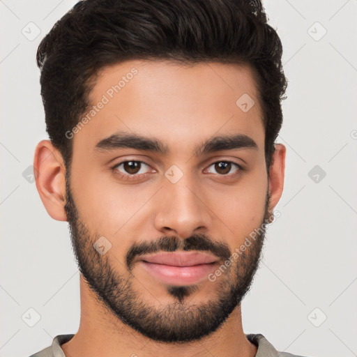 Joyful white young-adult male with short  black hair and brown eyes