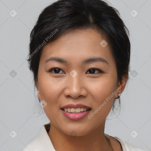 Joyful asian young-adult female with medium  brown hair and brown eyes