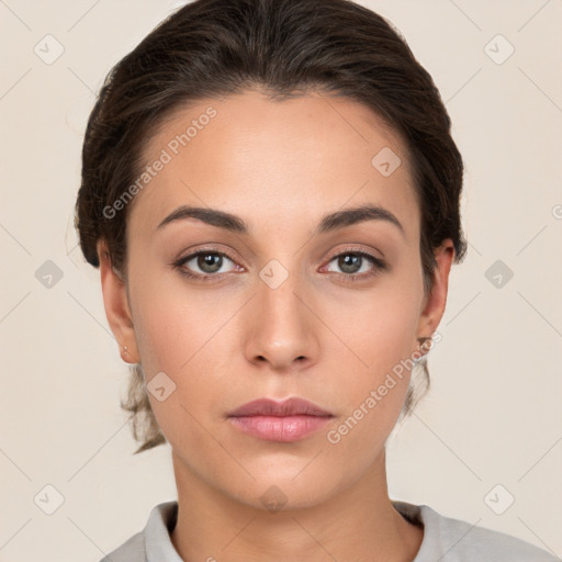 Neutral white young-adult female with short  brown hair and brown eyes