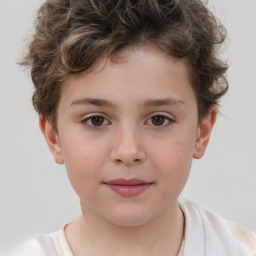 Joyful white child male with short  brown hair and brown eyes