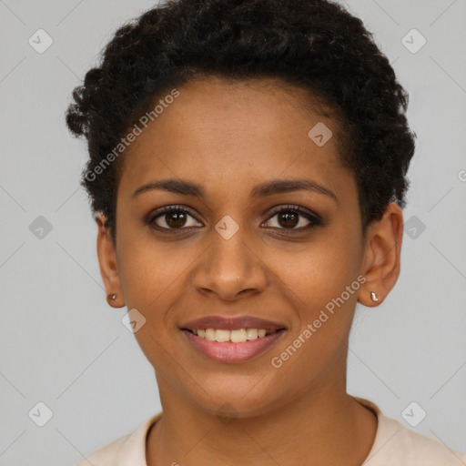 Joyful black young-adult female with short  brown hair and brown eyes