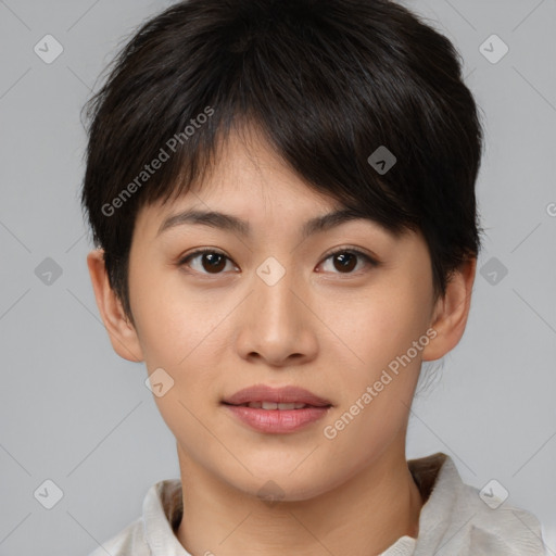 Joyful asian young-adult female with short  brown hair and brown eyes