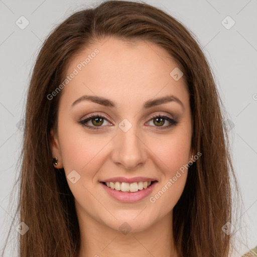 Joyful white young-adult female with long  brown hair and green eyes