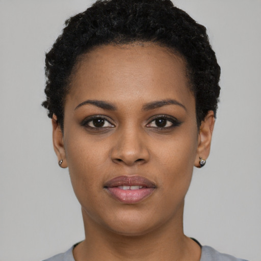Neutral black young-adult female with short  black hair and brown eyes