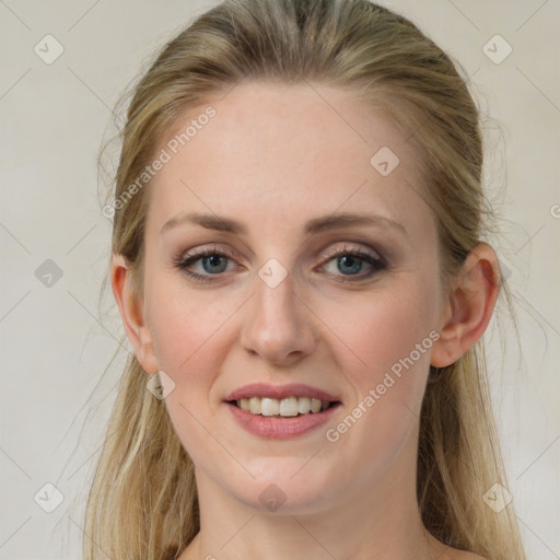 Joyful white young-adult female with long  brown hair and grey eyes