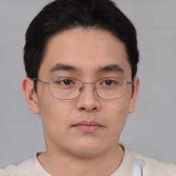 Neutral asian young-adult male with short  brown hair and brown eyes