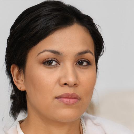 Neutral asian young-adult female with medium  brown hair and brown eyes