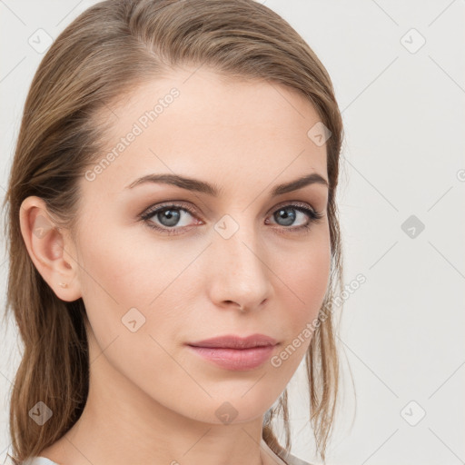 Neutral white young-adult female with long  brown hair and blue eyes