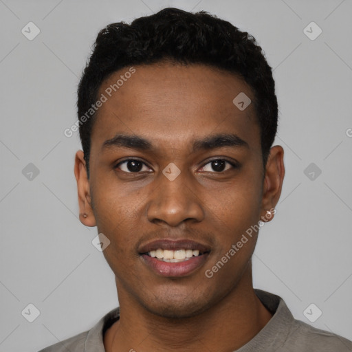 Joyful black young-adult male with short  black hair and brown eyes