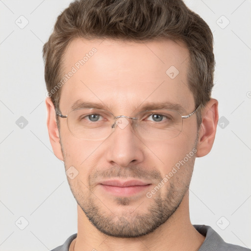 Joyful white adult male with short  brown hair and brown eyes