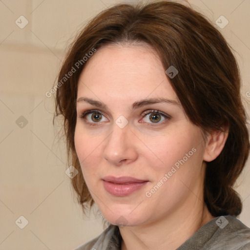 Joyful white adult female with medium  brown hair and grey eyes