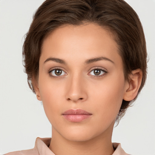 Neutral white young-adult female with short  brown hair and brown eyes