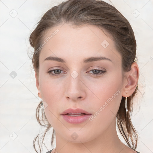 Neutral white young-adult female with medium  brown hair and grey eyes