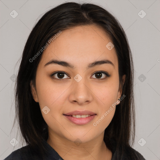 Joyful asian young-adult female with long  brown hair and brown eyes