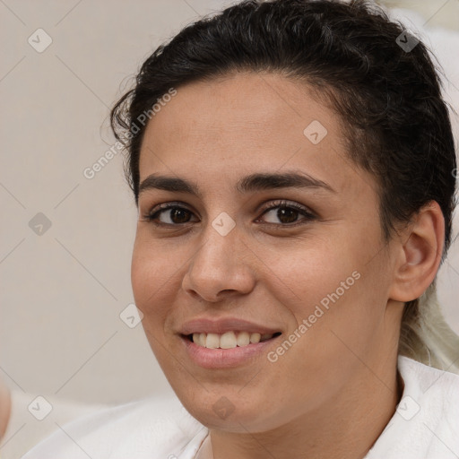 Joyful white young-adult female with short  brown hair and brown eyes