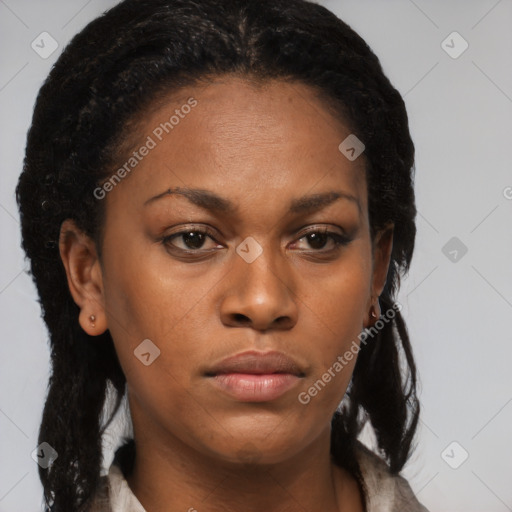 Neutral black young-adult female with medium  brown hair and brown eyes