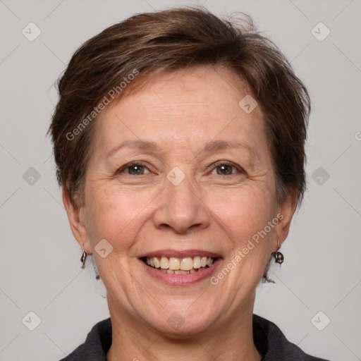 Joyful white adult female with short  brown hair and grey eyes