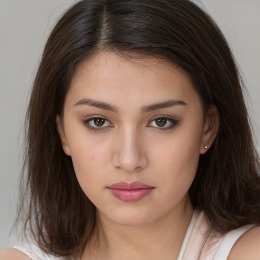 Neutral white young-adult female with medium  brown hair and brown eyes