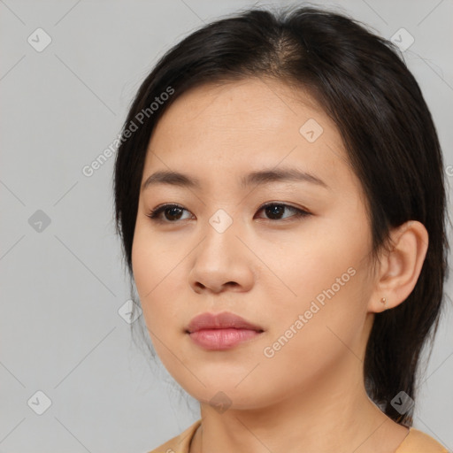 Neutral asian young-adult female with medium  brown hair and brown eyes