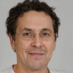 Joyful white middle-aged male with short  brown hair and brown eyes