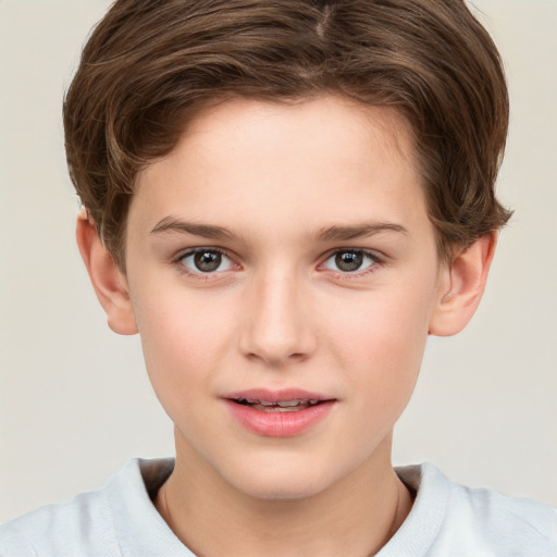 Joyful white child female with short  brown hair and brown eyes