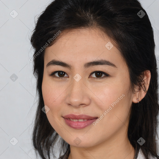 Joyful white young-adult female with medium  brown hair and brown eyes