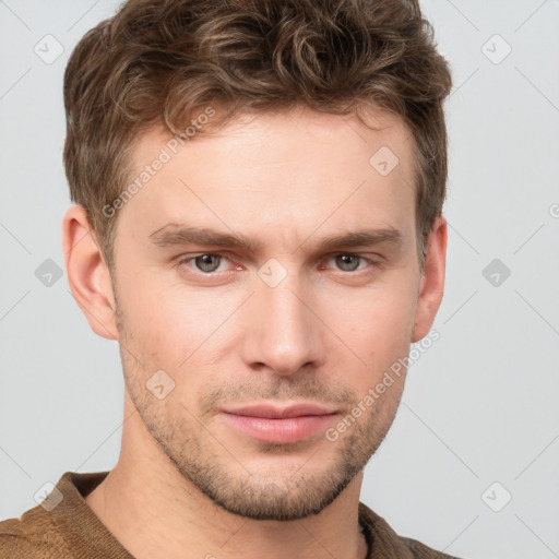 Neutral white young-adult male with short  brown hair and grey eyes