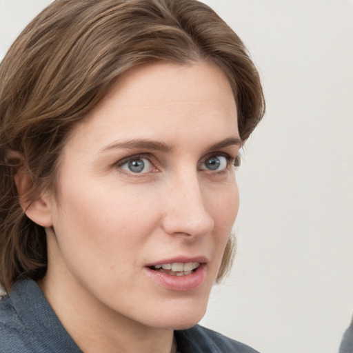 Neutral white young-adult female with medium  brown hair and grey eyes