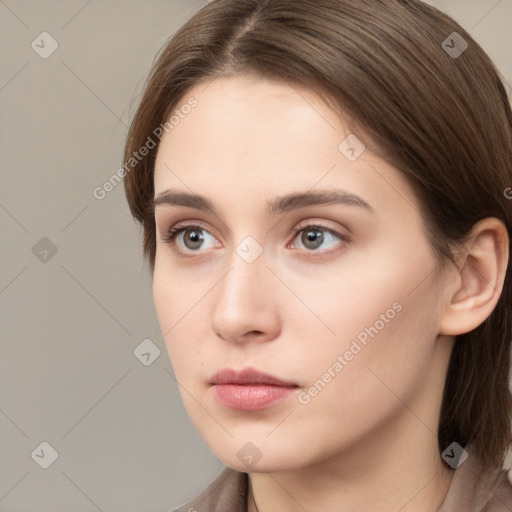 Neutral white young-adult female with medium  brown hair and grey eyes