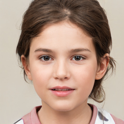 Joyful white child female with medium  brown hair and brown eyes