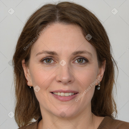 Joyful white young-adult female with medium  brown hair and green eyes