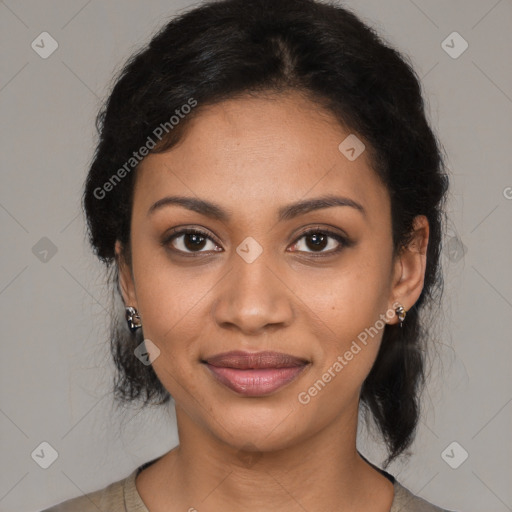 Joyful black young-adult female with medium  brown hair and brown eyes