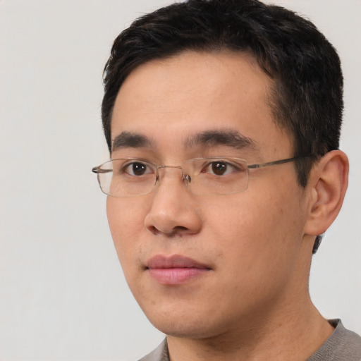 Neutral asian young-adult male with short  black hair and brown eyes