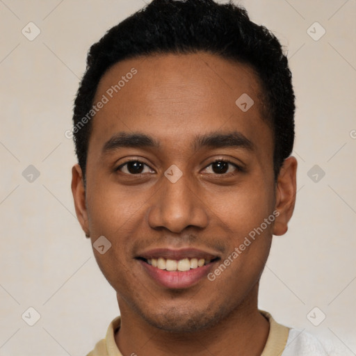 Joyful black young-adult male with short  black hair and brown eyes