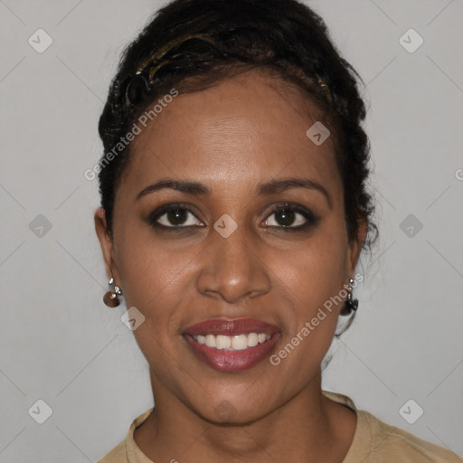 Joyful black young-adult female with short  black hair and brown eyes