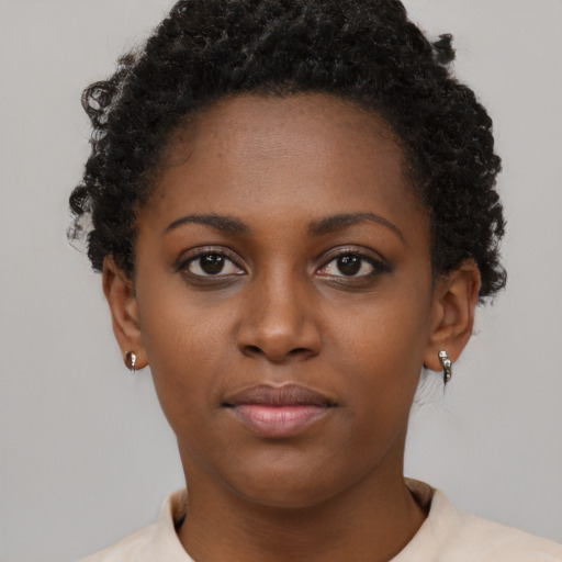 Neutral black young-adult female with short  brown hair and brown eyes
