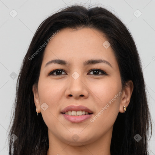 Joyful asian young-adult female with long  brown hair and brown eyes