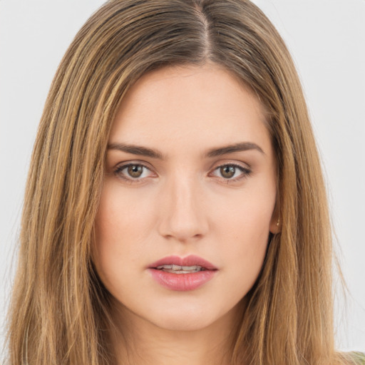 Neutral white young-adult female with long  brown hair and brown eyes