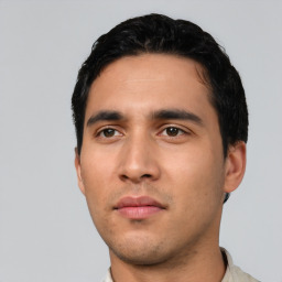 Neutral latino young-adult male with short  black hair and brown eyes