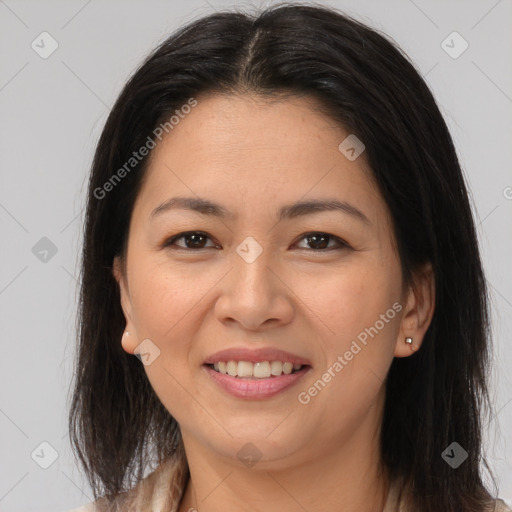 Joyful latino young-adult female with medium  brown hair and brown eyes